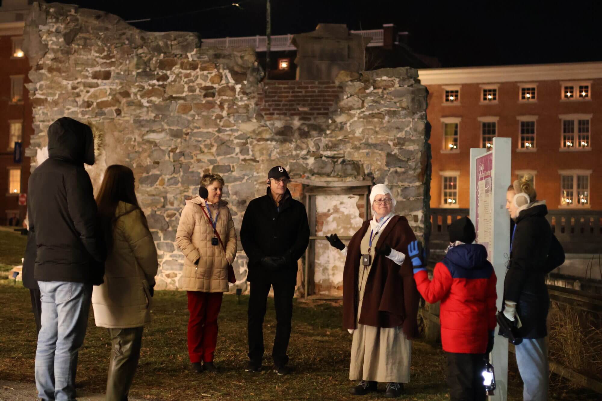 Docent with Guests on Christmas Tour