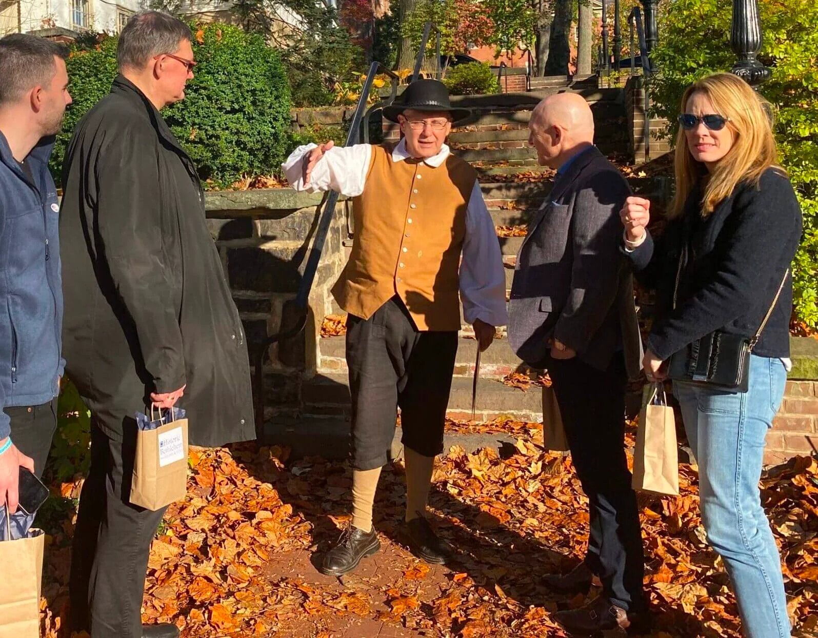 Guests taking an outdoor walking tour with their docent Ted