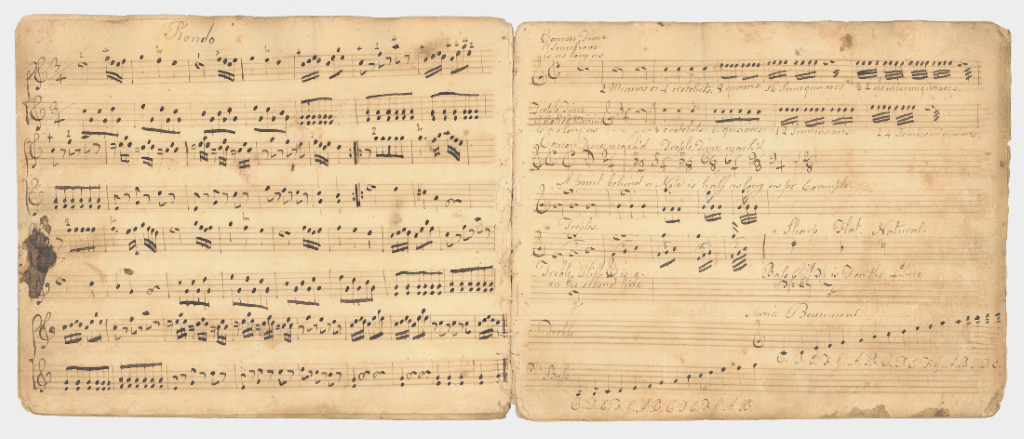 Two pages from a music book in the collection of the Moravian Museum of Bethlehem. The page on the right hand side has a faint signature reading